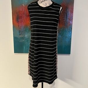Cute flowy dress stripes in the front and paisley on the back